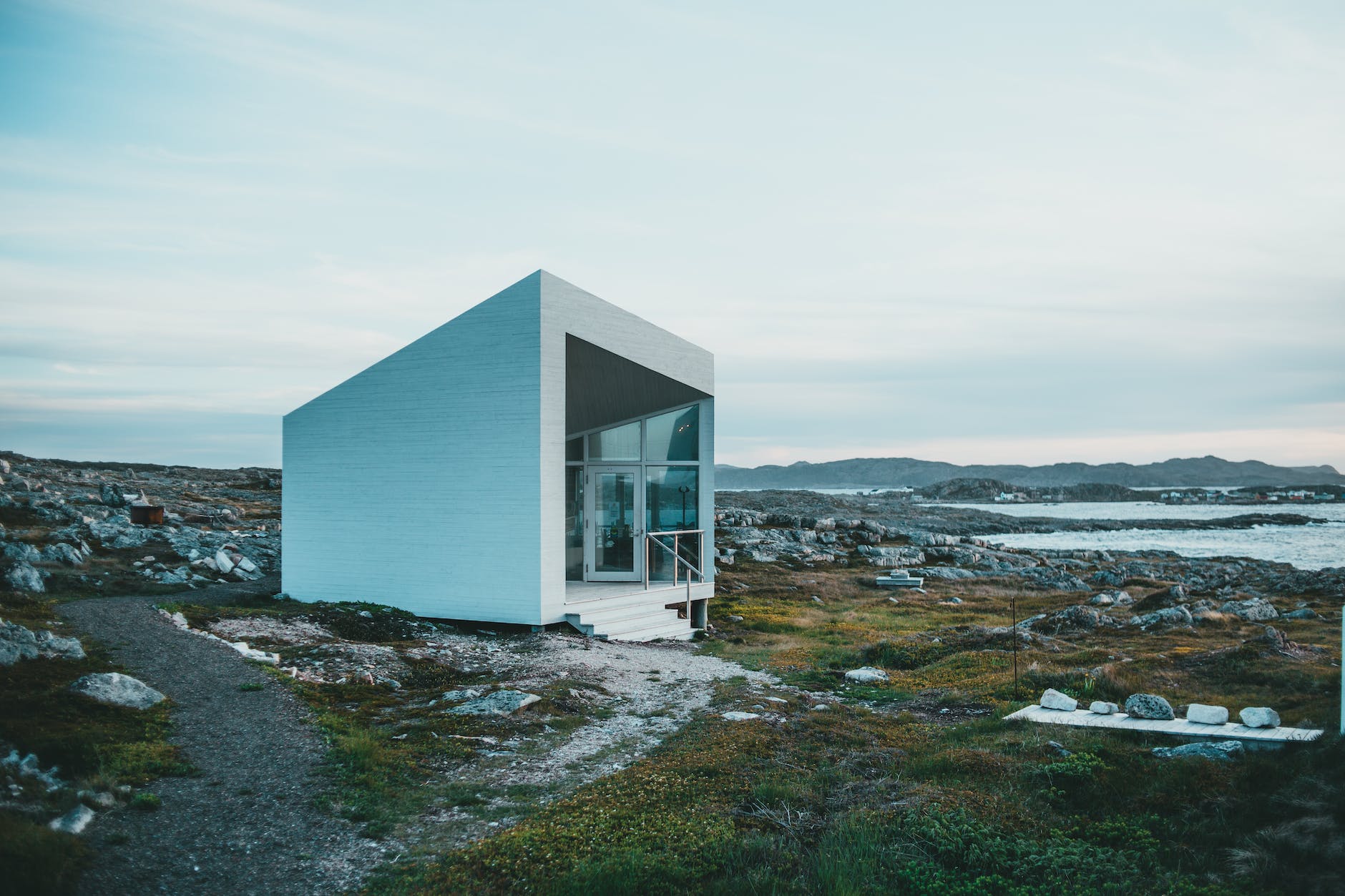 newly built tiny house on the rocky shore is a great example of when a home is tiny
